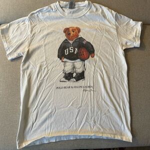 White t-shirt with Polo Bear holding a basketball
